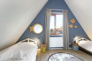 Vakantiehuis met kinderkamer met twee losse bedden