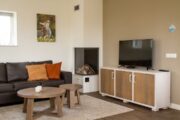 Woonkamer van boerderij in Ansen